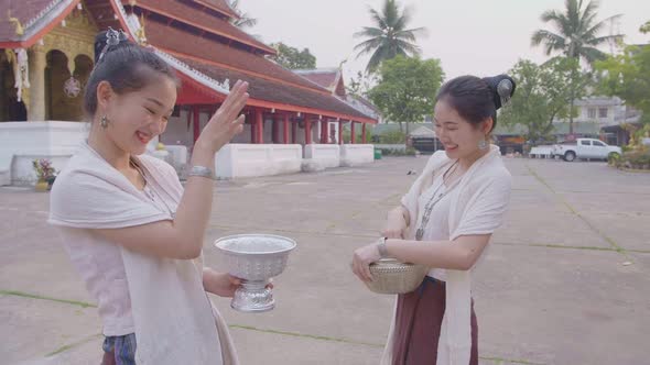 Lao Women Playing Splashing Water During With Lao Traditional Costume