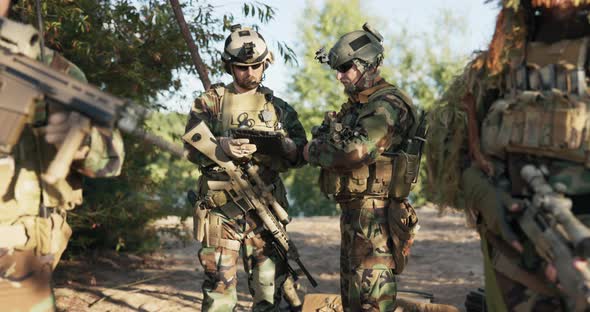 The Military Prepares for a Field Exercise Men Dressed in Moro Uniforms with Rifles Slung Over Their