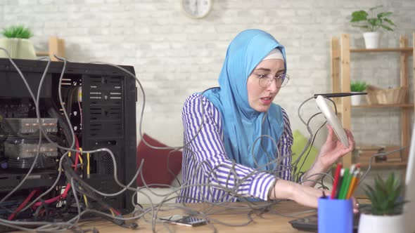 Upset Muslim Woman Because of the Poor Reception of Internet
