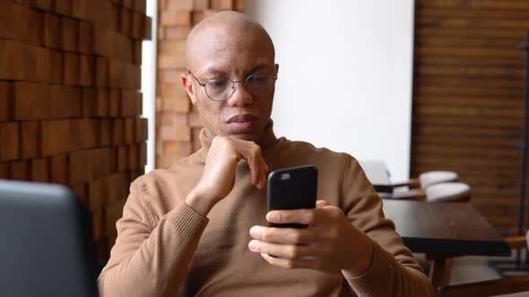 Young African Man in Camel Cashmere Sweater