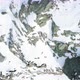 Overhead Aerial Top View Over Winter Snowy Mountain Rocks - VideoHive Item for Sale