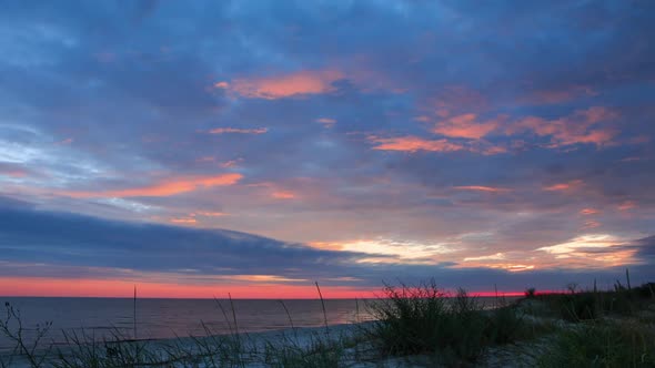 Dramatic Sky and Sunset over Beach