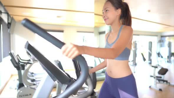 Woman run on treadmill in gym