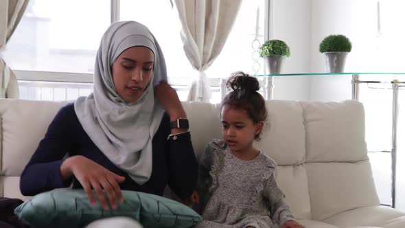 Mother and daughter at home