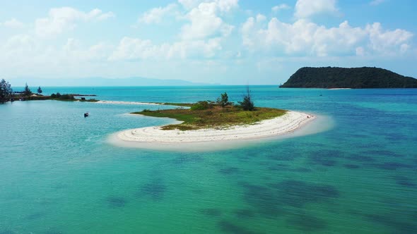 Luxury aerial copy space shot of a white sandy paradise beach and aqua turquoise water background 