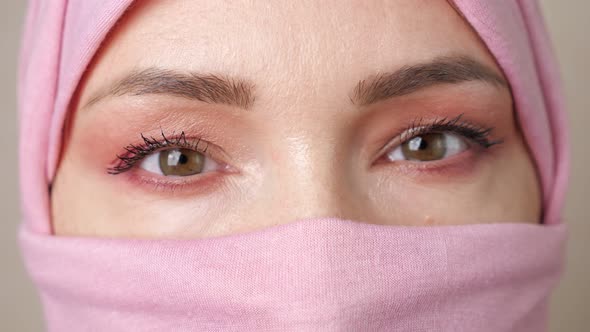 Closeup Eyes of a Muslim Woman Wearing a Closed Hijab