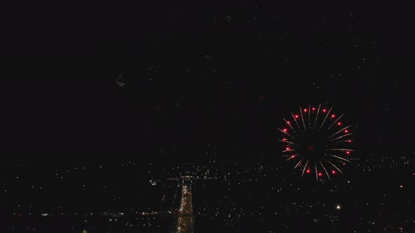 Closeup of Fireworks Over the Night City