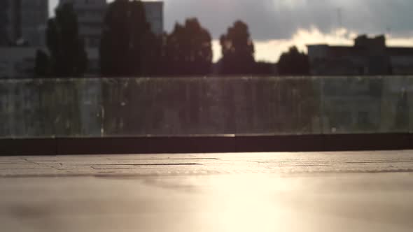 Legs of Skater Making Fakie Shove It Trick Outdoor