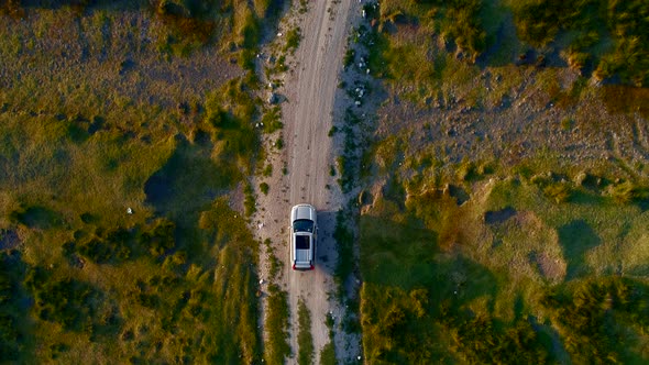 Aerial Car On Dirt Road