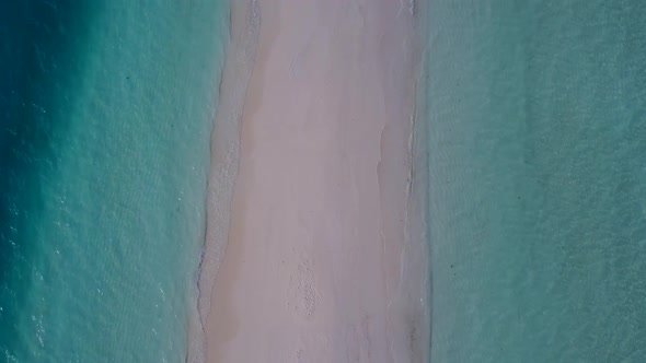 Aerial drone seascape of resort beach by blue sea with sand background