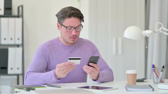 Online Shopping Success on Smartphone By Middle Aged Man