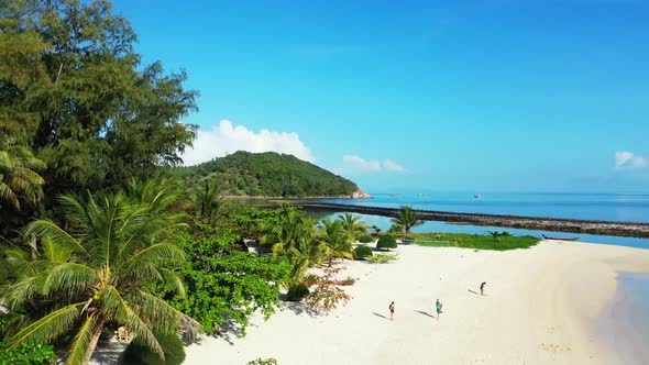 Aerial top view sky of relaxing bay beach trip by blue water with white sandy background of journey 