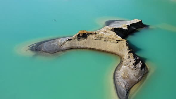 Drone View of the Turquoise Lake Formed As a Result of Mining Waste