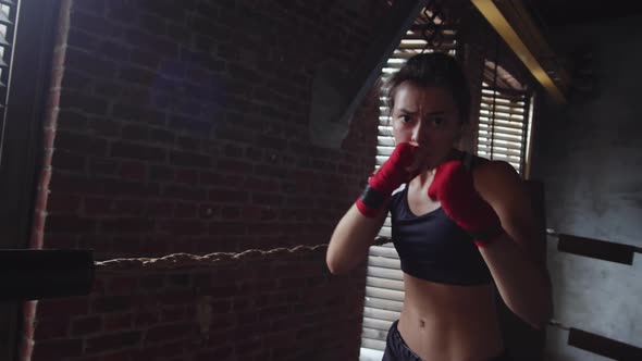 Athletic Aggressive Sportswoman Boxing