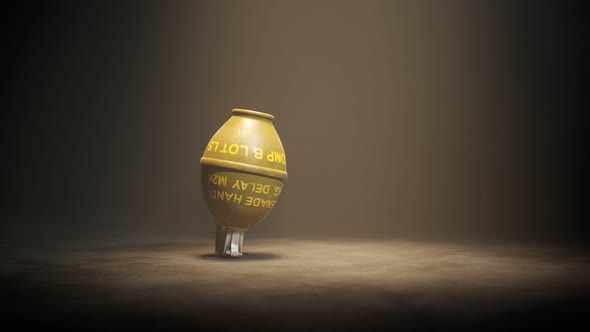 Falling M26 Grenade. Golden glitter explosion from the lemon grenade. 4K HD.