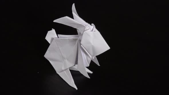 An Origami Rabbit on a Table - Closeup From Above