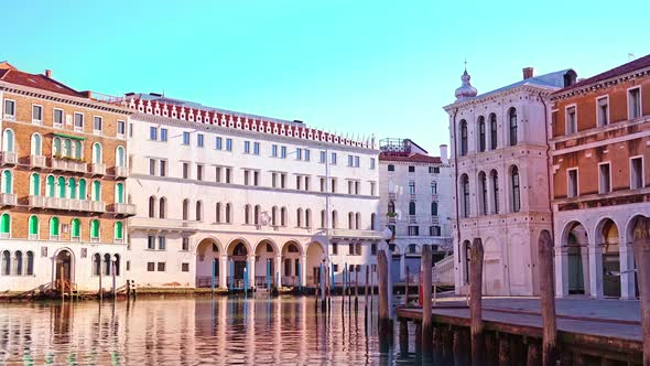 Motion Along Channel Between Old Buildings To Rialto Bridge