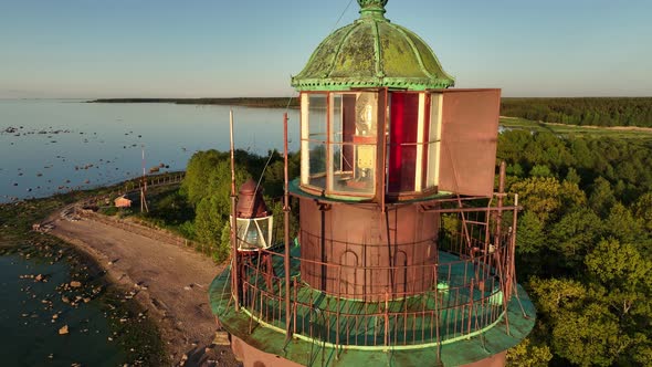 Aerial View of the Closeup Tower Lighthouse at Sunset