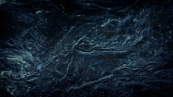 Dark Swirling River Surface