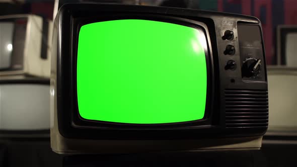 Vintage 1980s TV with Green Screen. Dolly Shot. 4K Version.