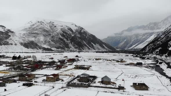 Drone Motion of Snowy Mountains Village