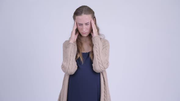 Young Stressed Pregnant Woman Having Headache