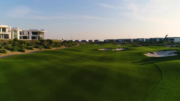 Aerial view of luxury golf club on residential area, Dubai, U.A.E.