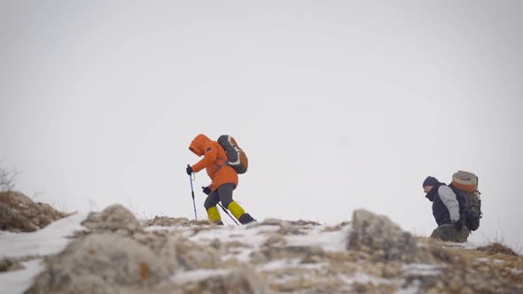 An Expedition of Two People Reached the Top. The Men Made a Halt.