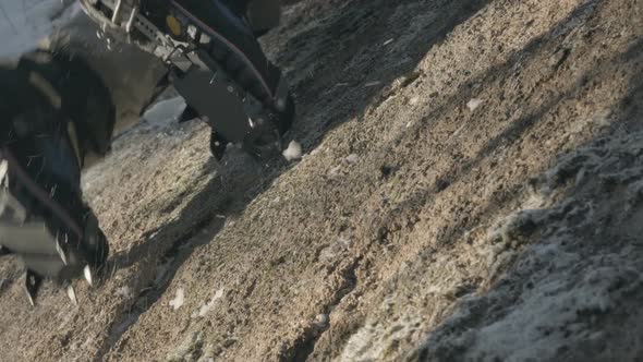 Close-up of Boots Climber Climbing the Frozen Mountain.