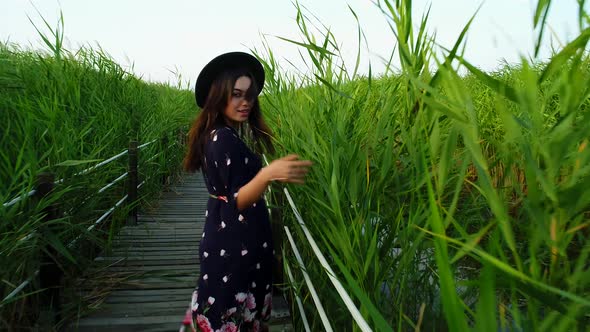 Young Woman Walking At Nature