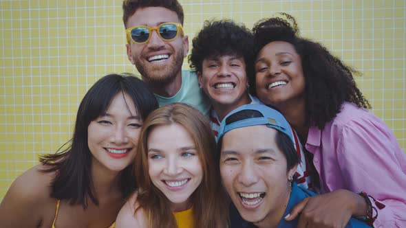 Group of friends having fun on the beach.