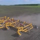 Closeup of a Seeder with a Plow Working in the Field - VideoHive Item for Sale