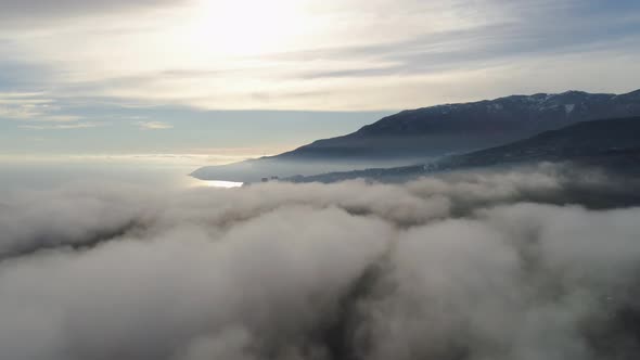 Mountain Landscape With Low Clouds