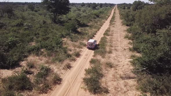 car driving on to Okavango, Aerial View, Botswana Chobe