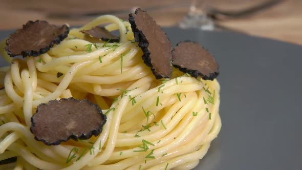 Slices of a Black Truffle Fall on the Spagetti