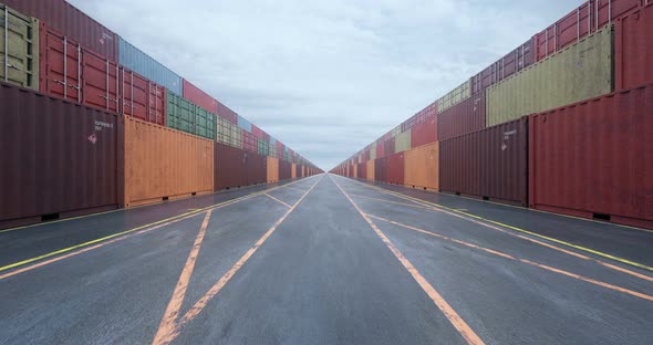 Infinite Rows of Cargo Shipping Containers under Overcast Sky alt