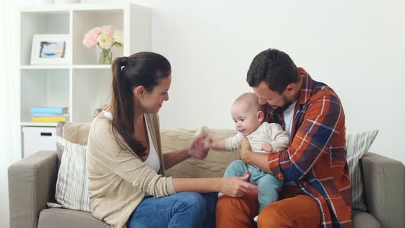 Happy Family with Baby at Home