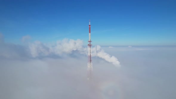 High tower above the fog