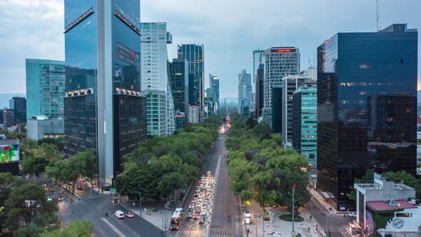 Aerial Hyperlapse Street View of Busy Urban Traffic on Multi Lane Road Urban Canyon Surrounded By