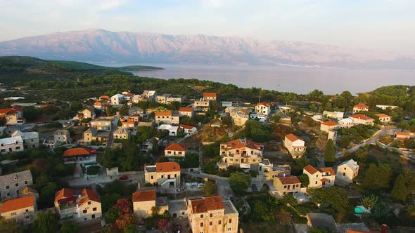 Moving aerial drone shot of the town Selca Island Brac Croatia Europe