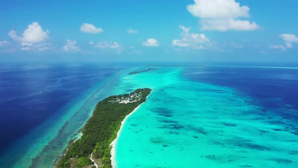 Aerial top view scenery of perfect resort beach wildlife by turquoise water and clean sandy backgrou