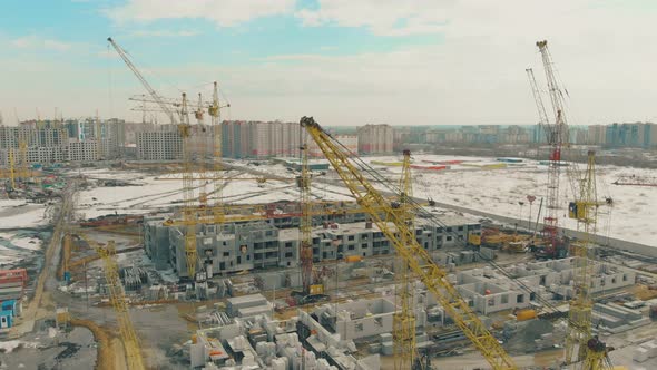 View of Undone Project with Yellow Construction Cranes