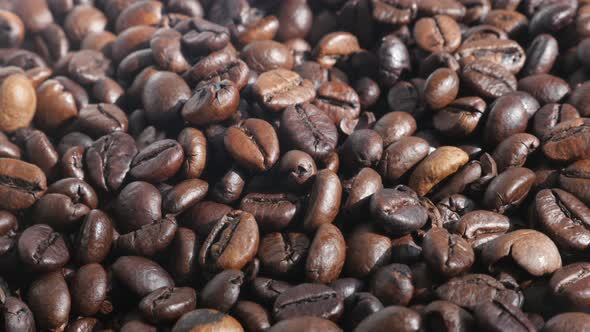 Coffee background with roasted beans 4K slow pan footage