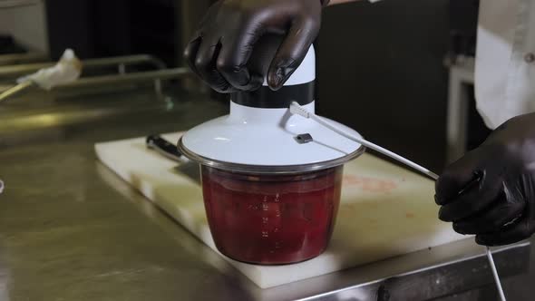 Closeup of the Chef Whipping Up Chili Sauce for Meat in a Blender