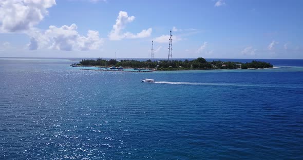 Natural overhead island view of a paradise sunny white sand beach and blue sea background in colourful