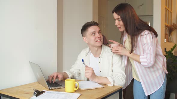Attractive Girl Drinking Coffee While Her Husband Preparing for Meeting