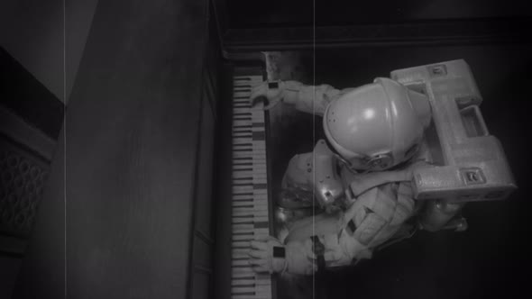 Astranaut in a Spacesuit Plays the Piano in a Spaceship Overlooking the Planet Earth
