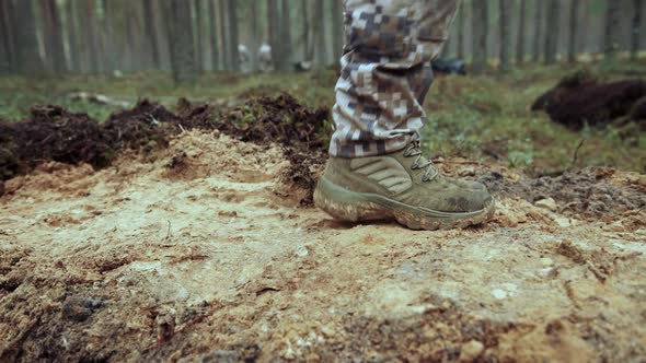 Soldiers Prepare a Trench in a Pine Forest