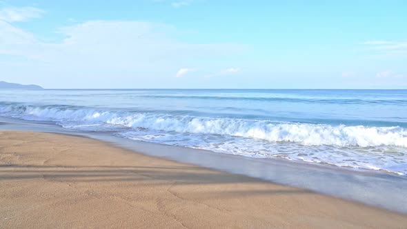 Beautiful tropical beach sea ocean with blue sky and white cloud