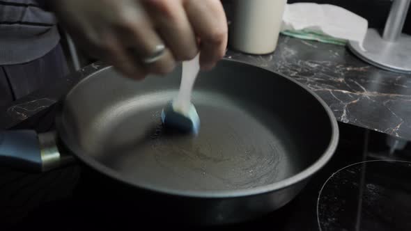 Cooking Pancakes for Breakfast in the Kitchen